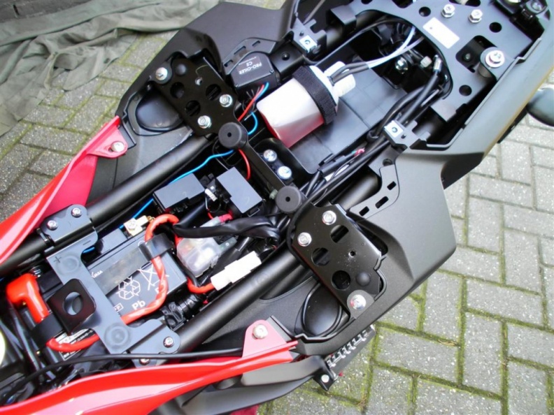 Pretty tight under the seat, but it all fits container and pump.JPG
