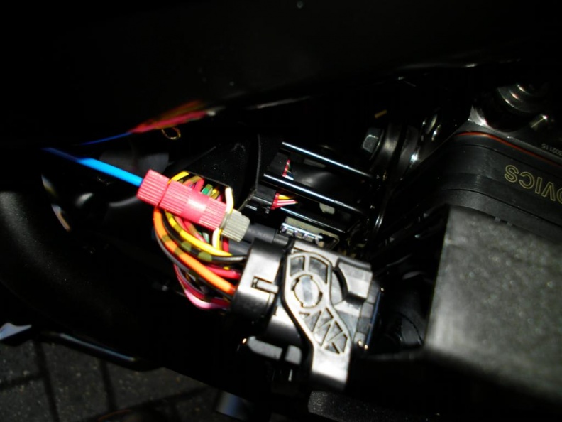 Tapping the speedo signal is very easy, but of course you can use our GPS module too
speedo tap.JPG