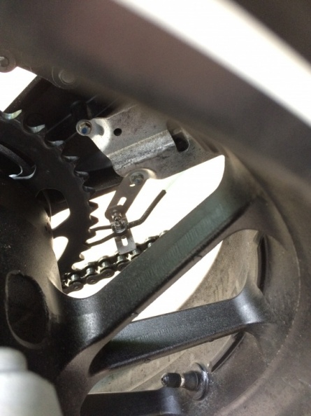 one of the bolts in the swing arm is used to install the nozzle bracket nozzle.jpg