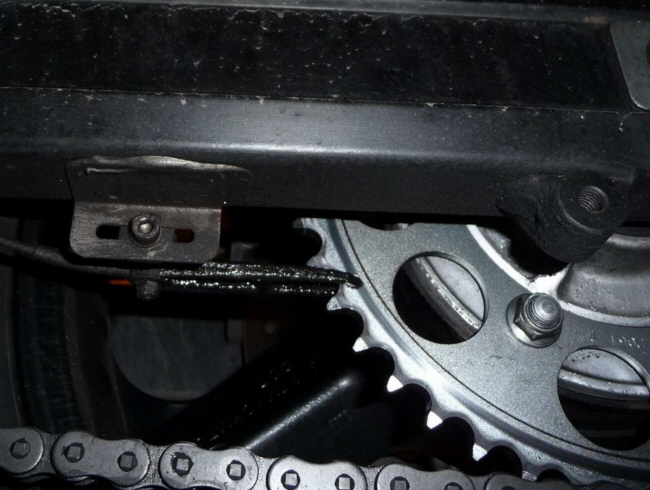 Nozzle is installed here with epoxy glue.
Do NOT use superlue.
Of course you can use the self tapping bolts from the kit too. nozzle.jpg